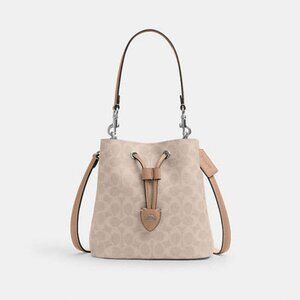 Rowan Bucket Bag In Signature Canvas